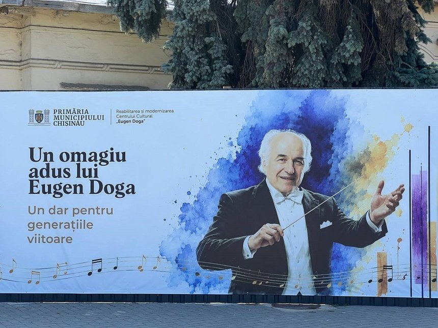 Gafă pe un banner din Capitală: Eugen Doga, înfățișat cu șase degete la o mână și patru la cealaltă